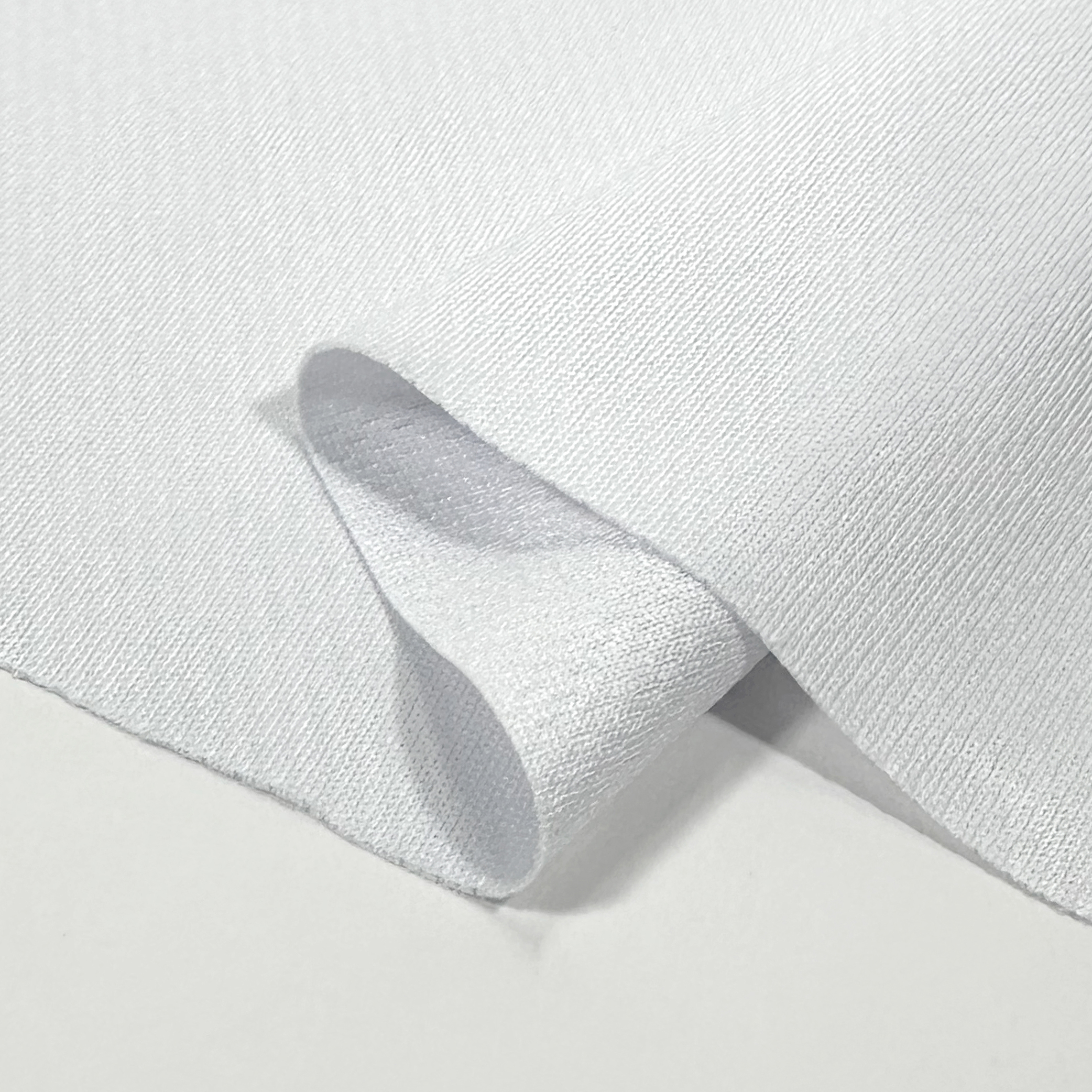 Resto-Core Flatback Mesh 200 - 100 fabric texture and appearance